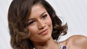 Zendaya on the red carpet in a stunning outfit, representing her unique style and fashion-forward choices.
